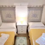 מלון דירות Giardini Di Badus 4*